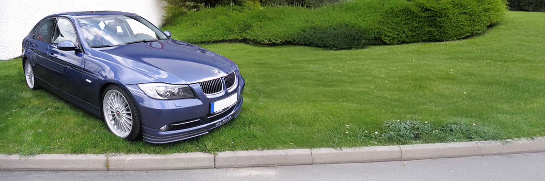 Banner image of a  Alpina B3 D3 E90 featuring original Alpina wheels.