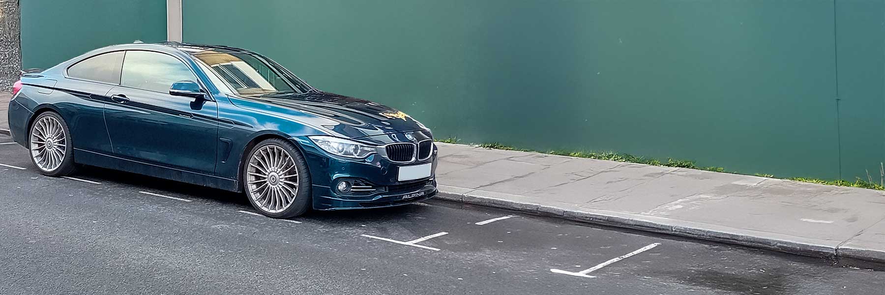 Banner image of a  Alpina B3 D3 F32 featuring original Alpina wheels.