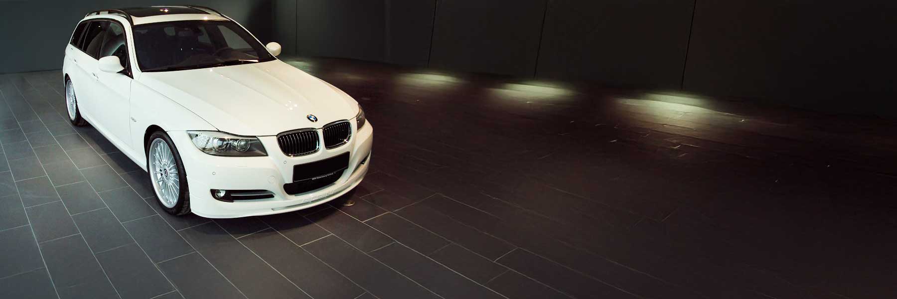 Banner image of a  Alpina B3 D3 E91 featuring original Alpina wheels.