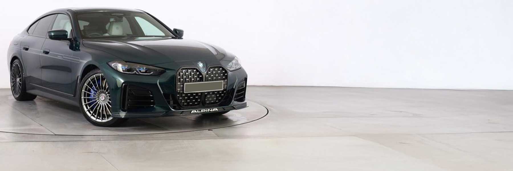 Banner image of a  Alpina B4 D4 G26 featuring original Alpina wheels.