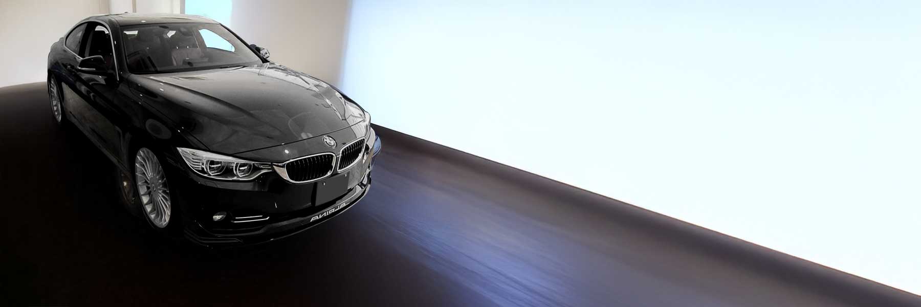 Banner image of a  Alpina B4 D4 F32 featuring original Alpina wheels.