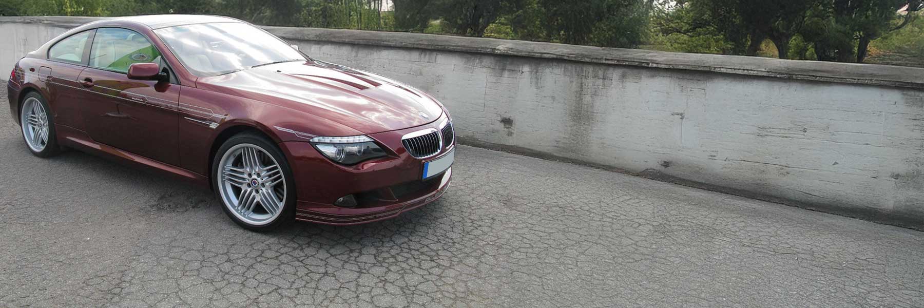Banner image of a  Alpina B6 E64 featuring original Alpina wheels.