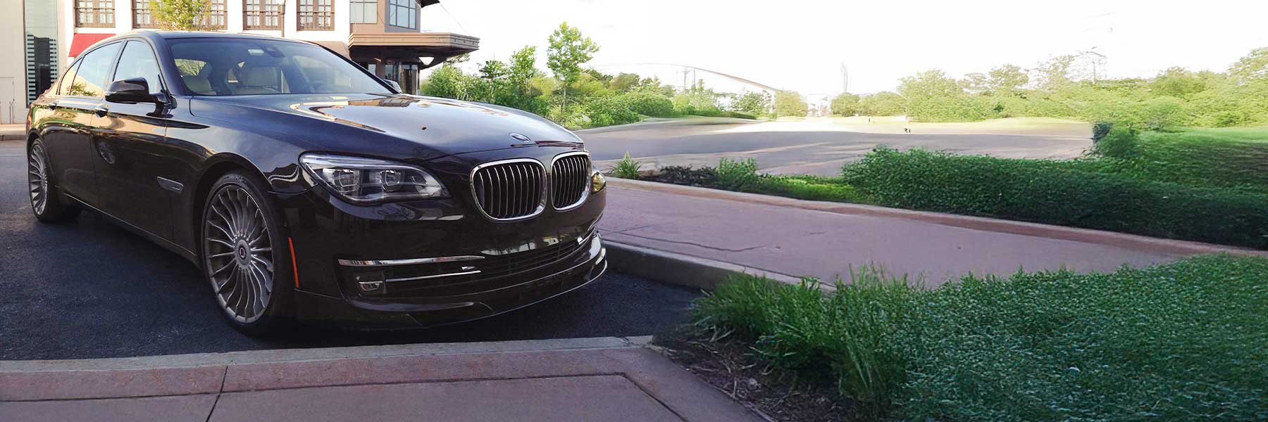 Banner image of a  Alpina B7 F02 featuring original Alpina wheels.