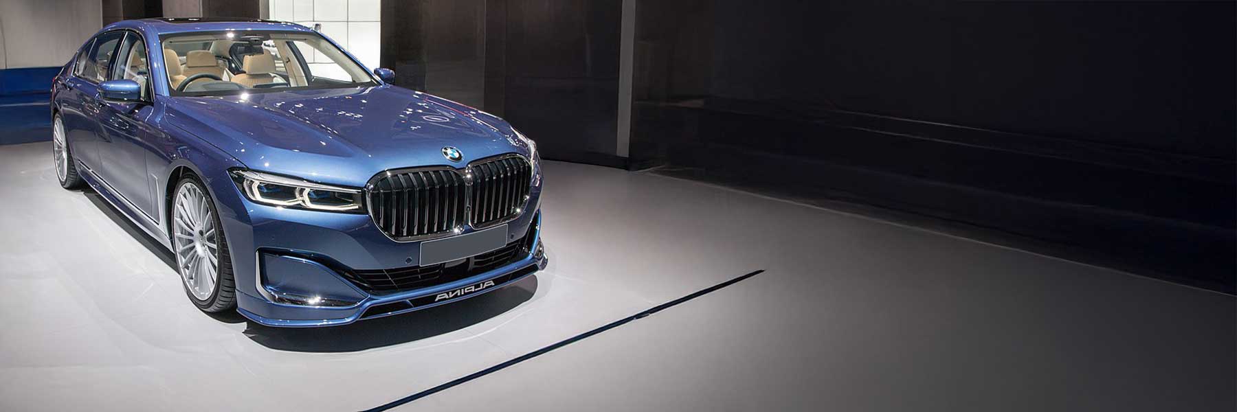 Banner image of a  Alpina B7 G12 featuring original Alpina wheels.