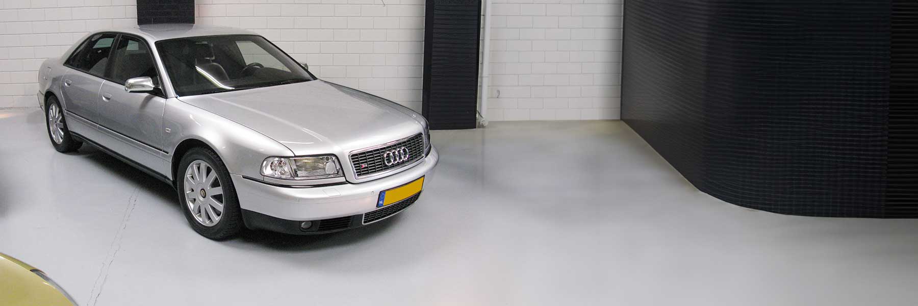 Banner image of a  Audi A8 & S8 D3 (4E) featuring original Audi wheels.