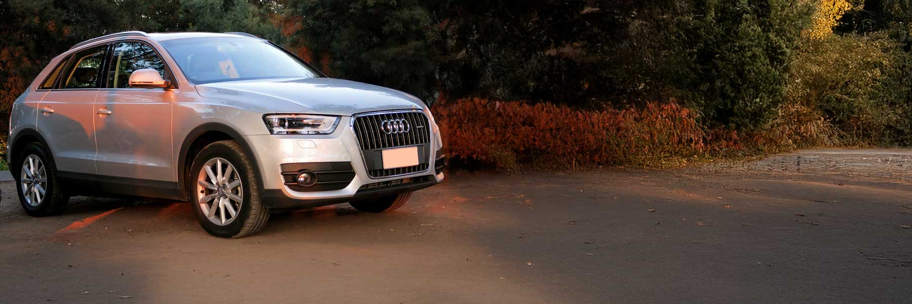 Banner image of a  Audi Q3 8U featuring original Audi wheels.