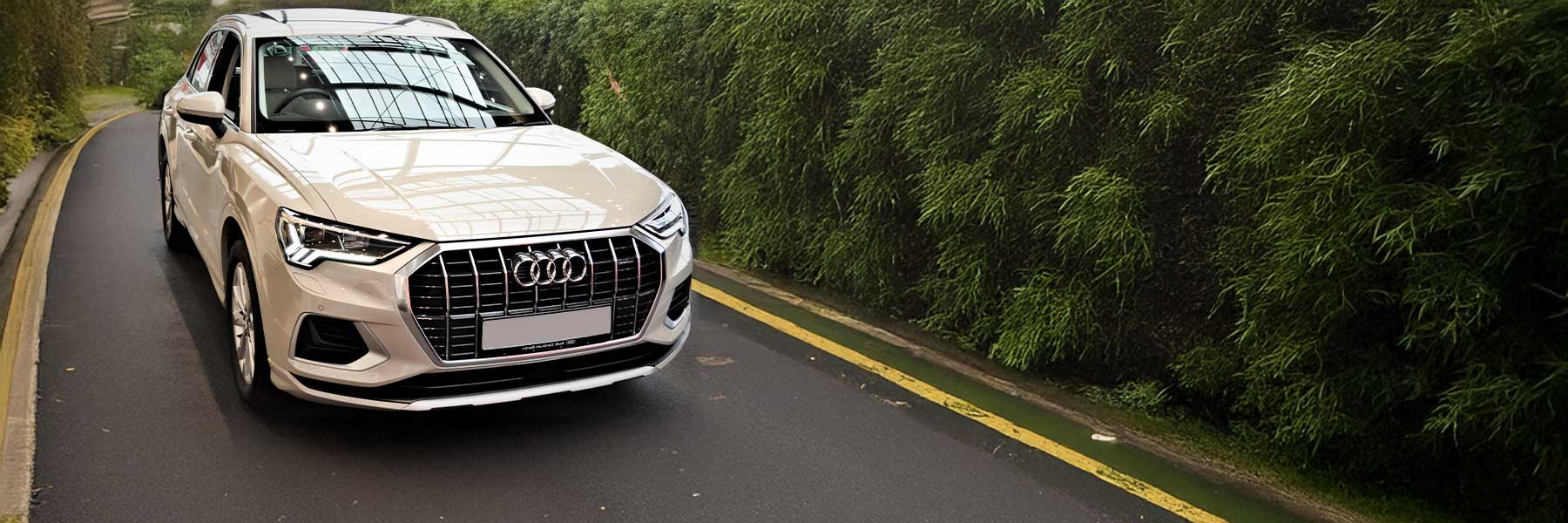 Banner image of a  Audi Q3 83A F3 featuring original Audi wheels.