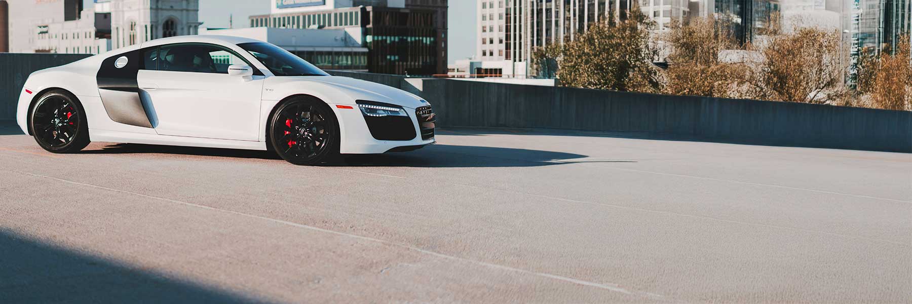 Banner image of a  Audi R8 42 featuring original Audi wheels.