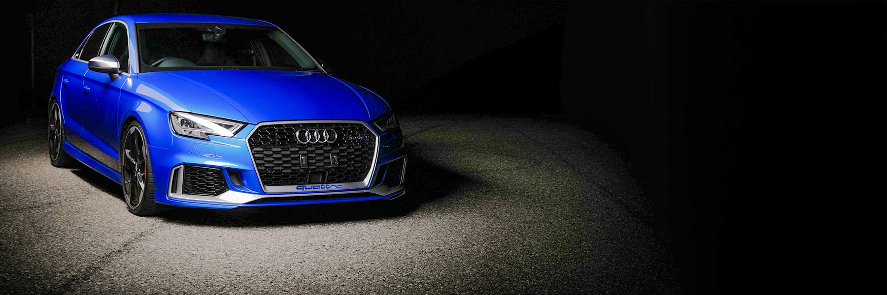 Banner image of a  Audi RS3 8V featuring original Audi wheels.