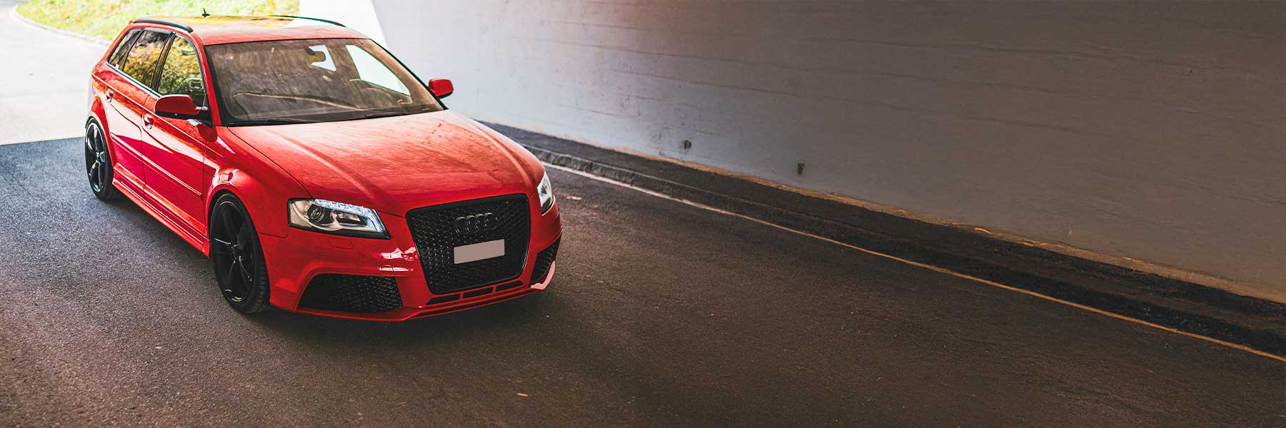 Banner image of a  Audi RS3 8P featuring original Audi wheels.