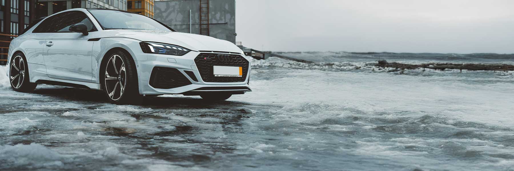 Banner image of a  Audi RS5 B9 (8W) featuring original Audi wheels.