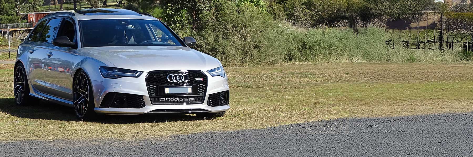 Banner image of a  Audi RS6 C7 (4G) featuring original Audi wheels.