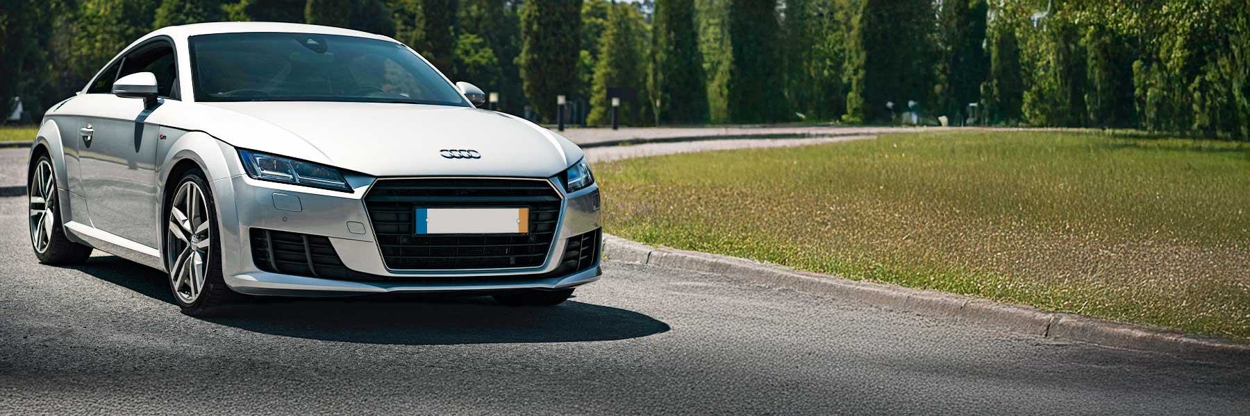 Banner image of a  Audi TT 8S featuring original Audi wheels.