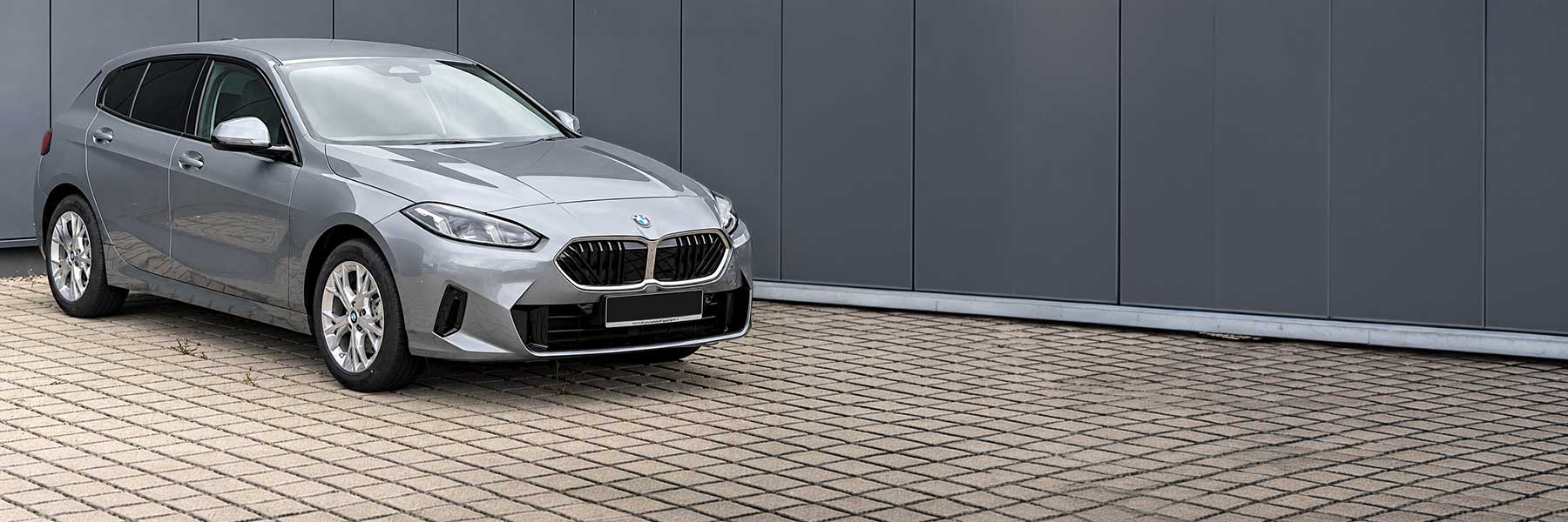 Banner image of a  BMW 1 Series F70 featuring original BMW wheels.