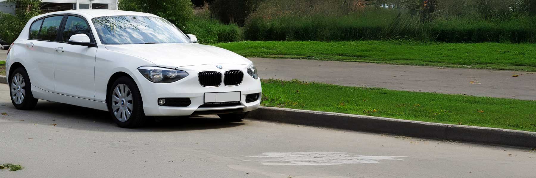 Banner image of a  BMW 1 Series F20 featuring original BMW wheels.