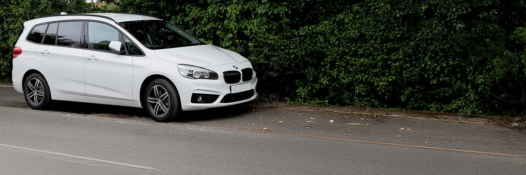 Banner image of a  BMW 2 Series F46 featuring original BMW wheels.