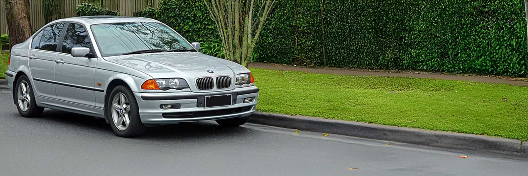 Banner image of a  BMW 3 Series E46 featuring original BMW wheels.