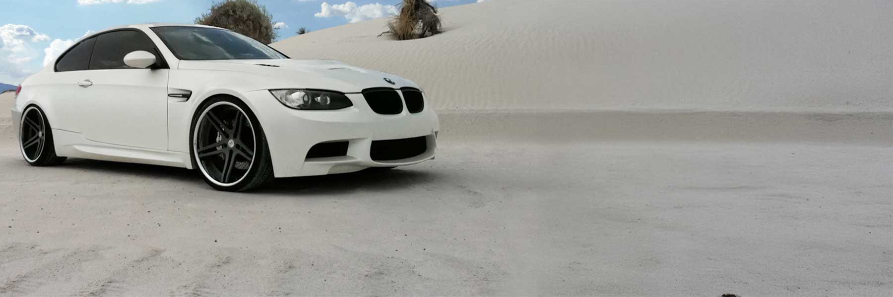Banner image of a  BMW 3 Series E92 featuring original BMW wheels.