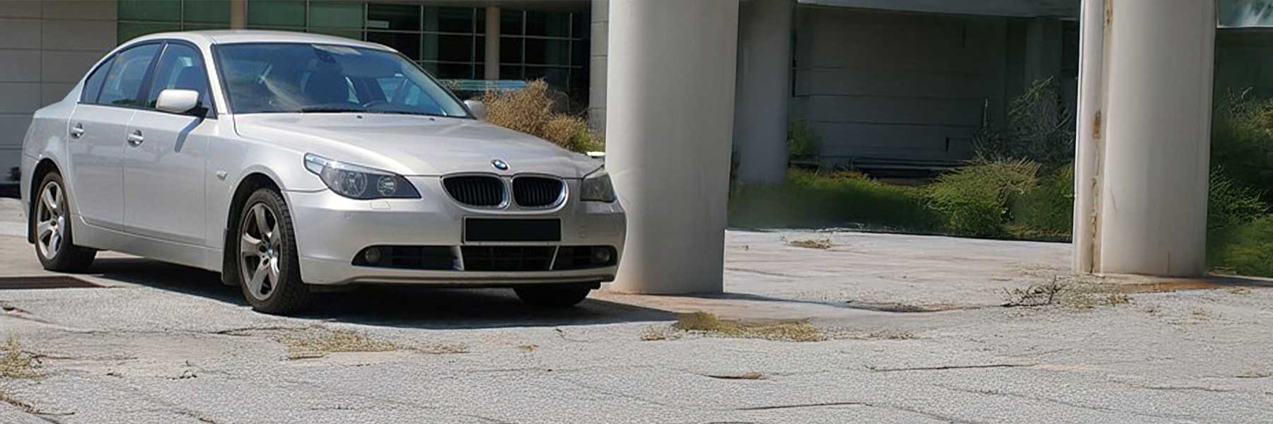 Banner image of a  BMW 5 Series E60 featuring original BMW wheels.