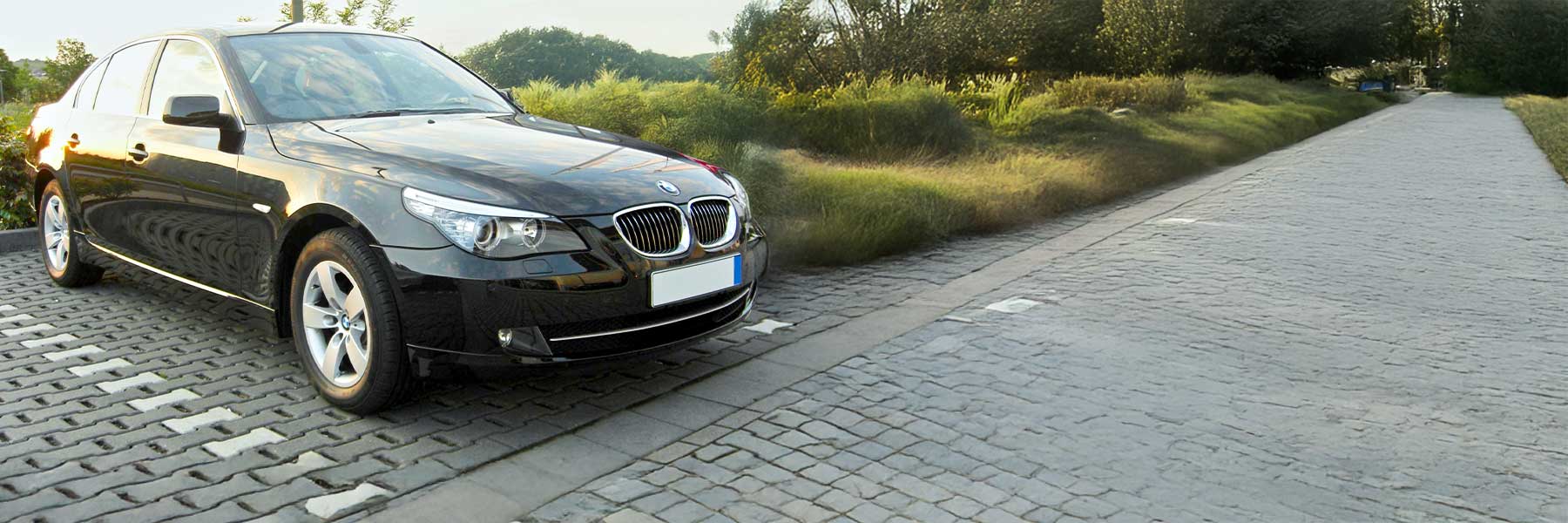 Banner image of a  BMW 5 Series E61 featuring original BMW wheels.