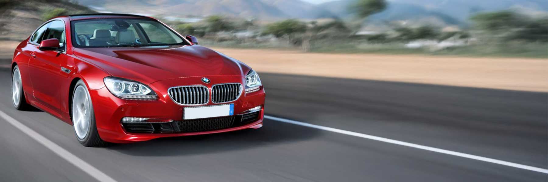 Banner image of a  BMW 6 Series F06 featuring original BMW wheels.
