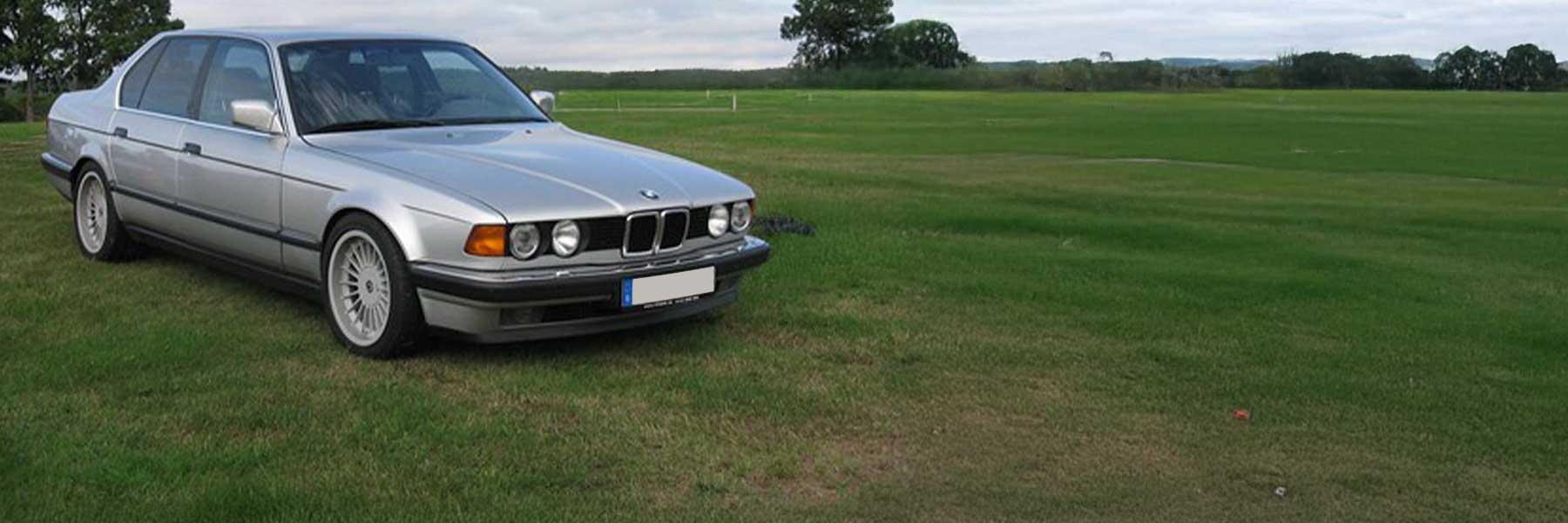 Banner image of a  BMW 7 Series E67 featuring original BMW wheels.