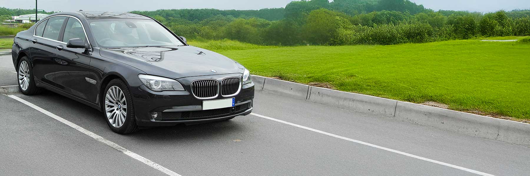 Banner image of a  BMW 7 Series F04 featuring original BMW wheels.