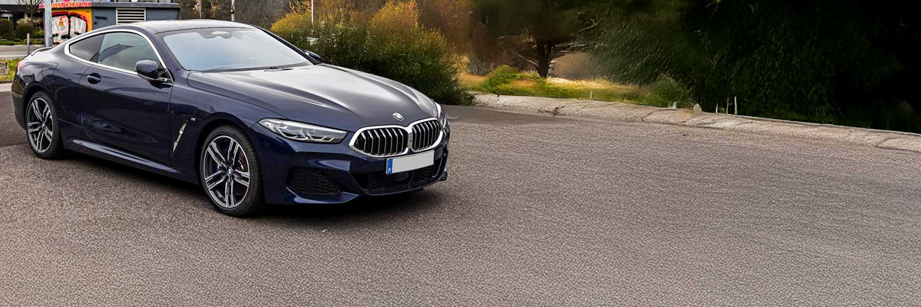 Banner image of a  BMW 8 Series G14 featuring original BMW wheels.
