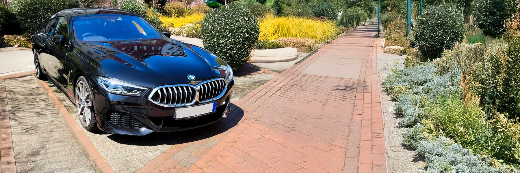 Banner image of a  BMW 8 Series G16 featuring original BMW wheels.