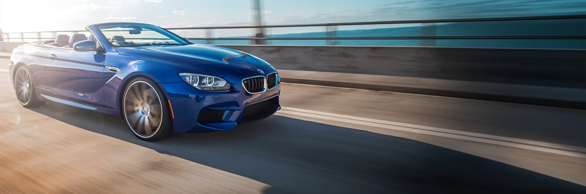 Banner image of a  BMW 6 Series F12 featuring original BMW wheels.