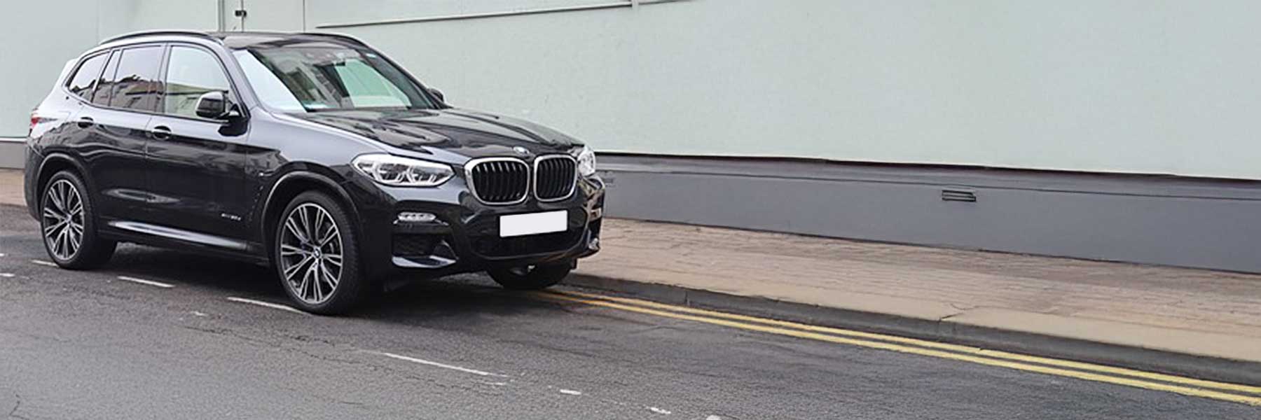 Banner image of a  BMW X3 M F97 featuring original BMW wheels.