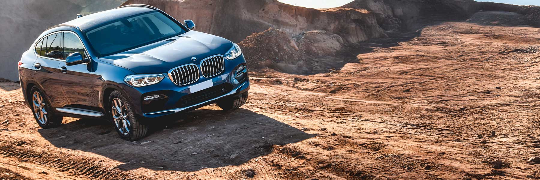 Banner image of a  BMW X4 G02 featuring original BMW wheels.