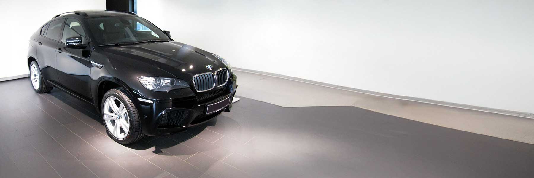 Banner image of a  BMW X6 M E71 featuring original BMW wheels.