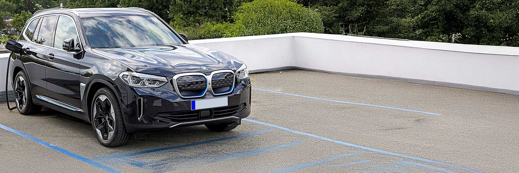 Banner image of a  BMW iX3 G08 featuring original BMW wheels.