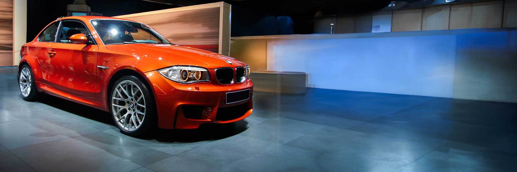 Banner image of a  BMW 1 Series E82 featuring original BMW wheels.