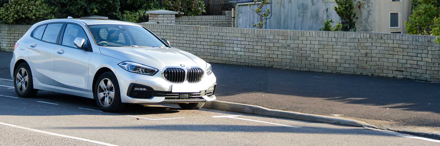 Banner image of a  BMW 1 Series F40 featuring original BMW wheels.