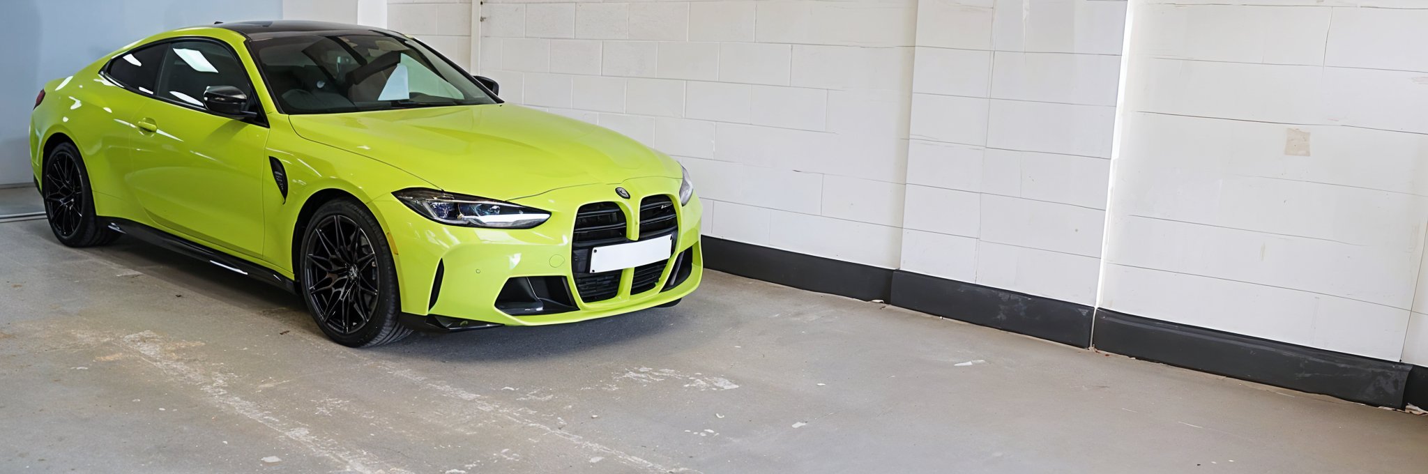 Banner image of a  BMW 4 Series G22 featuring original BMW wheels.