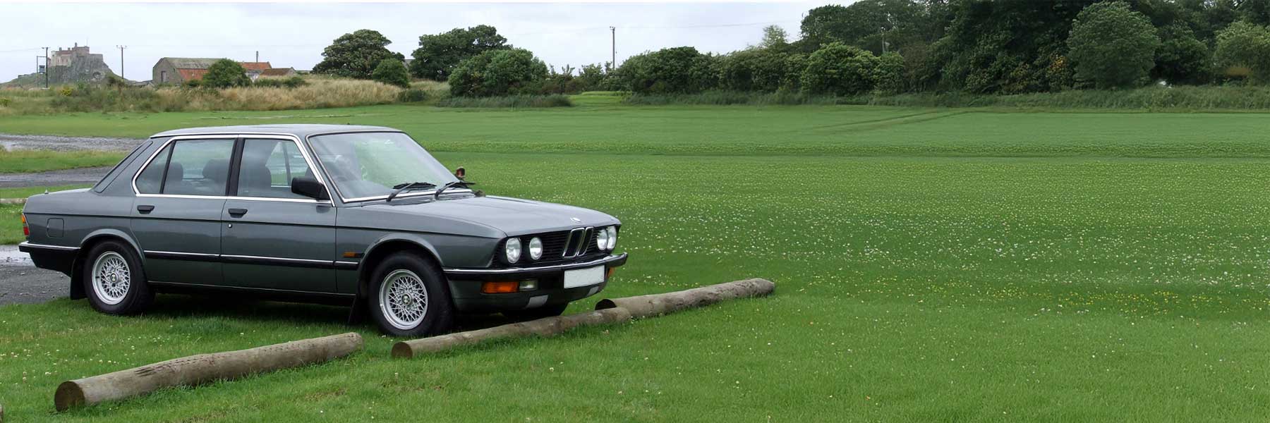 Banner image of a  BMW 5 Series E28 featuring original BMW wheels.