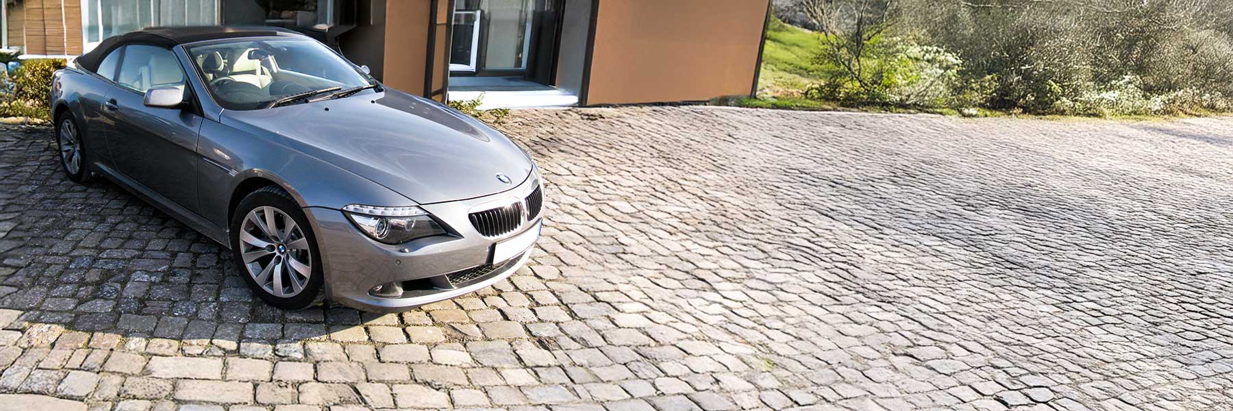 Banner image of a  BMW 6 Series E64 featuring original BMW wheels.