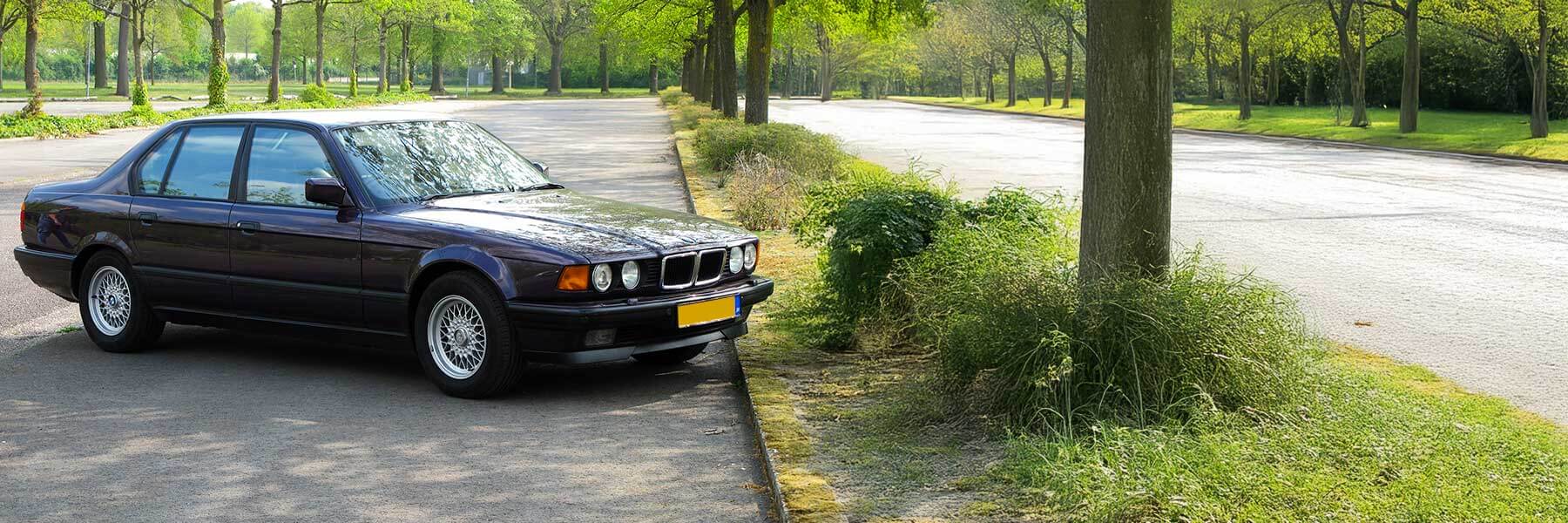 Banner image of a  BMW 7 Series E32 featuring original BMW wheels.