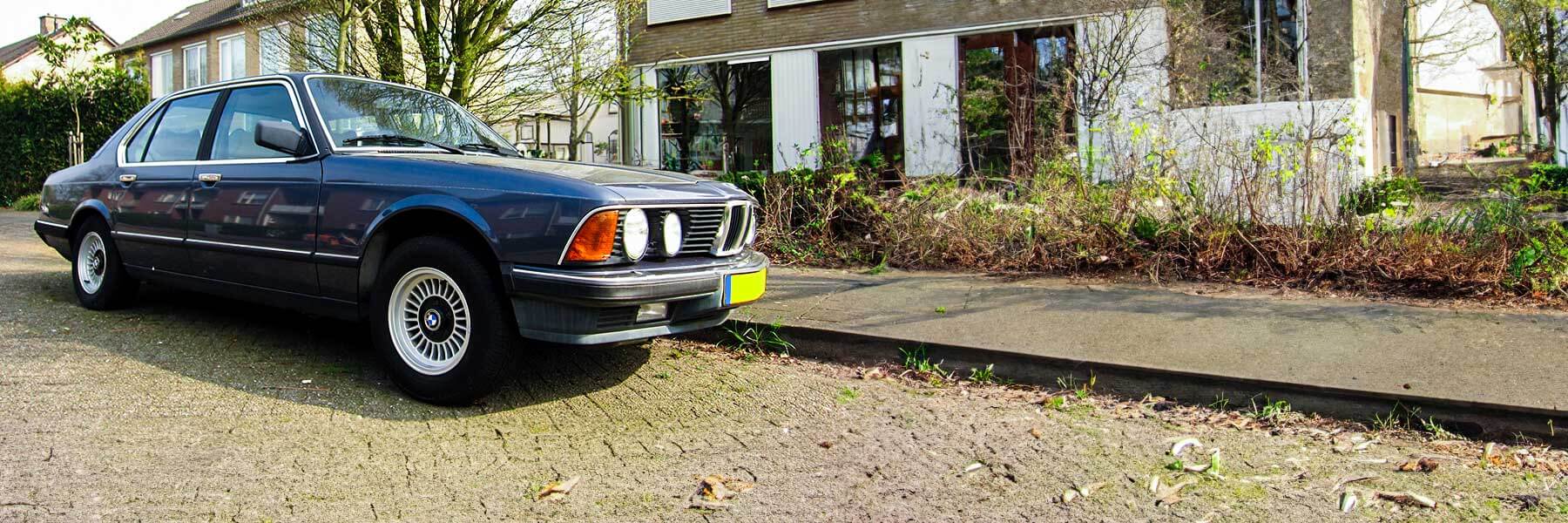 Banner image of a  BMW 7 Series E23 featuring original BMW wheels.