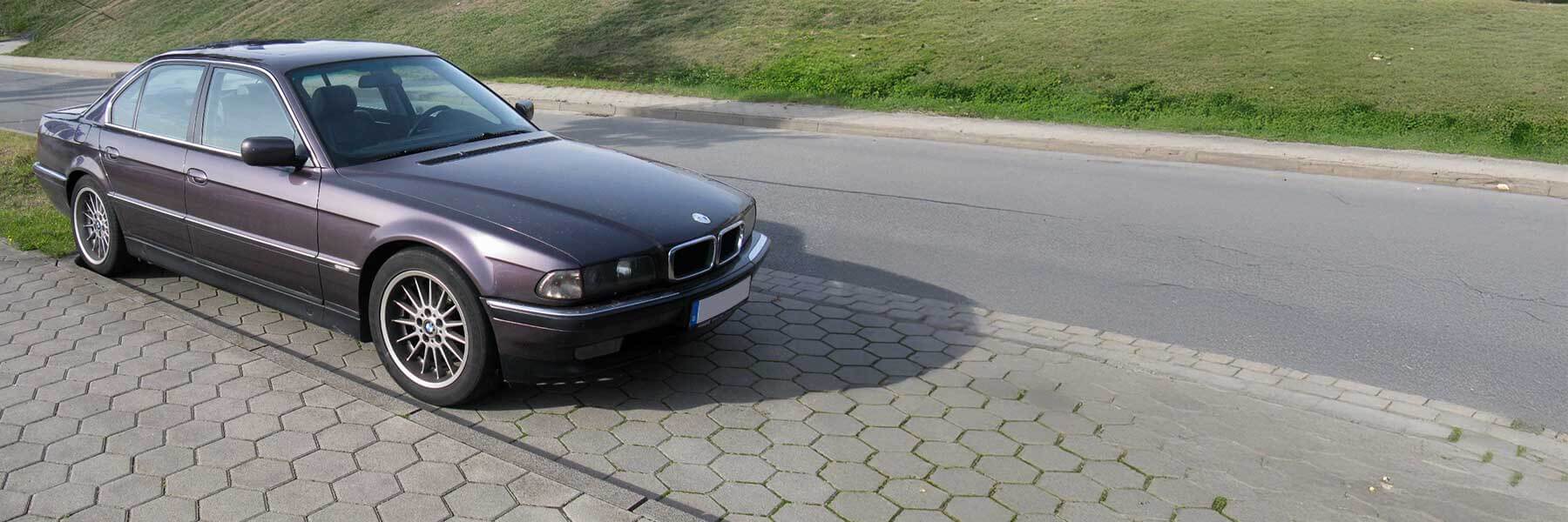 Banner image of a  BMW 7 Series E38 featuring original BMW wheels.