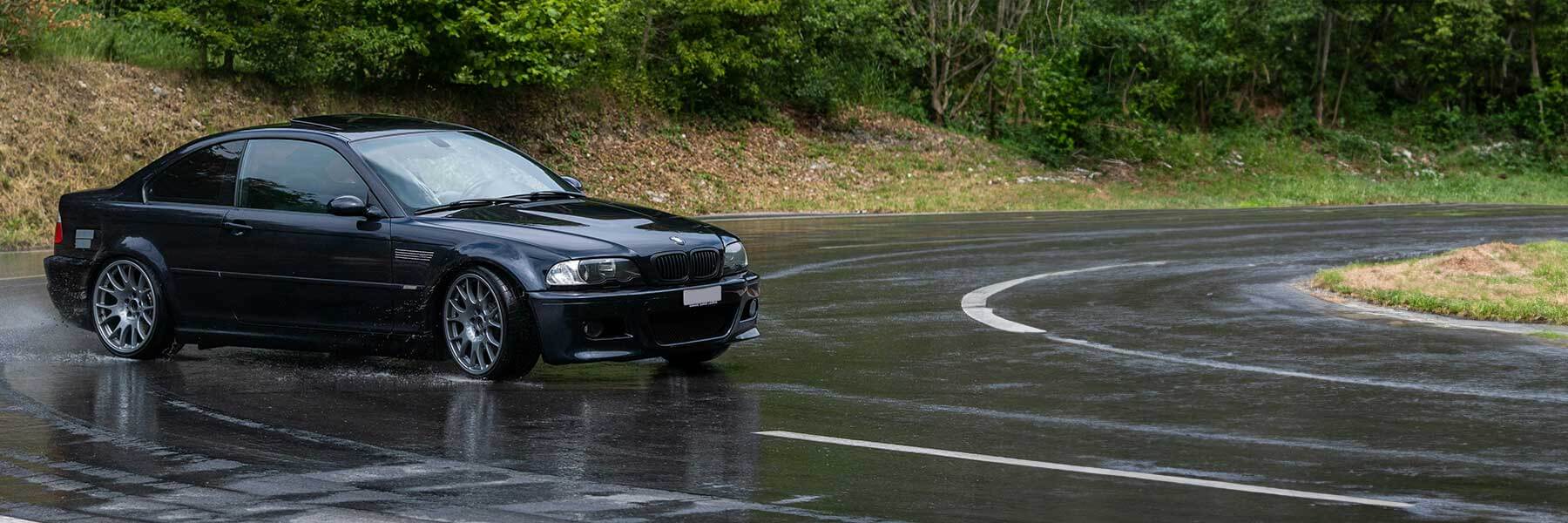 Banner image of a  BMW M3 E46 featuring original BMW wheels.