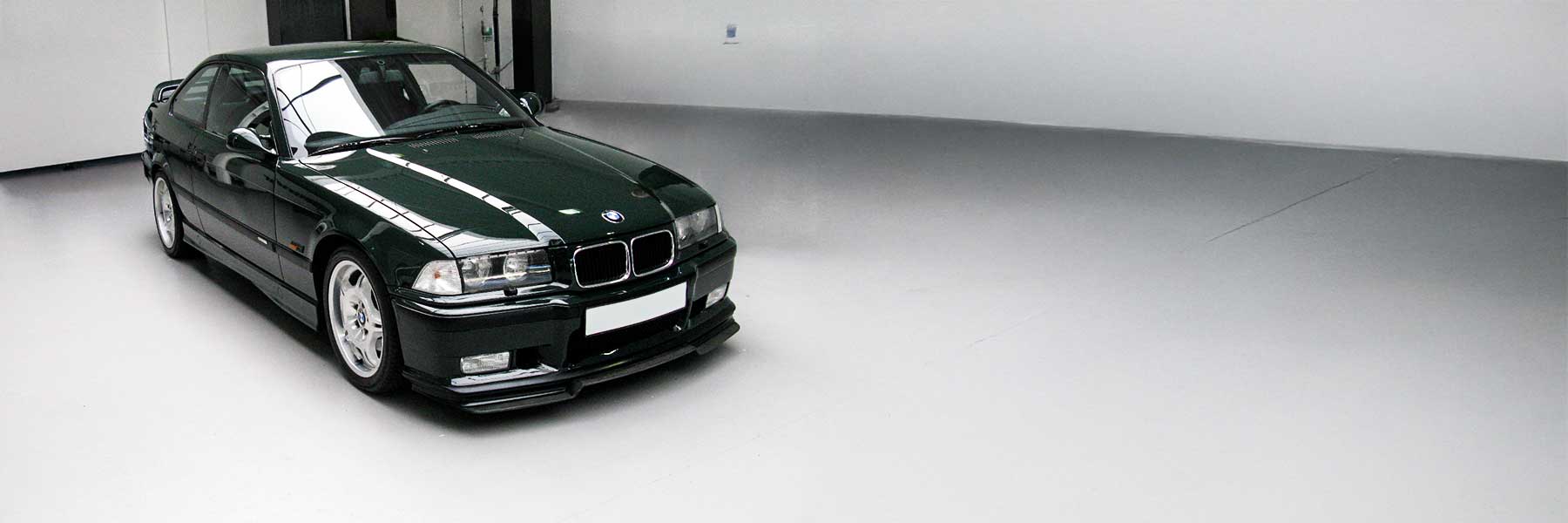 Banner image of a  BMW M3 E36 featuring original BMW wheels.