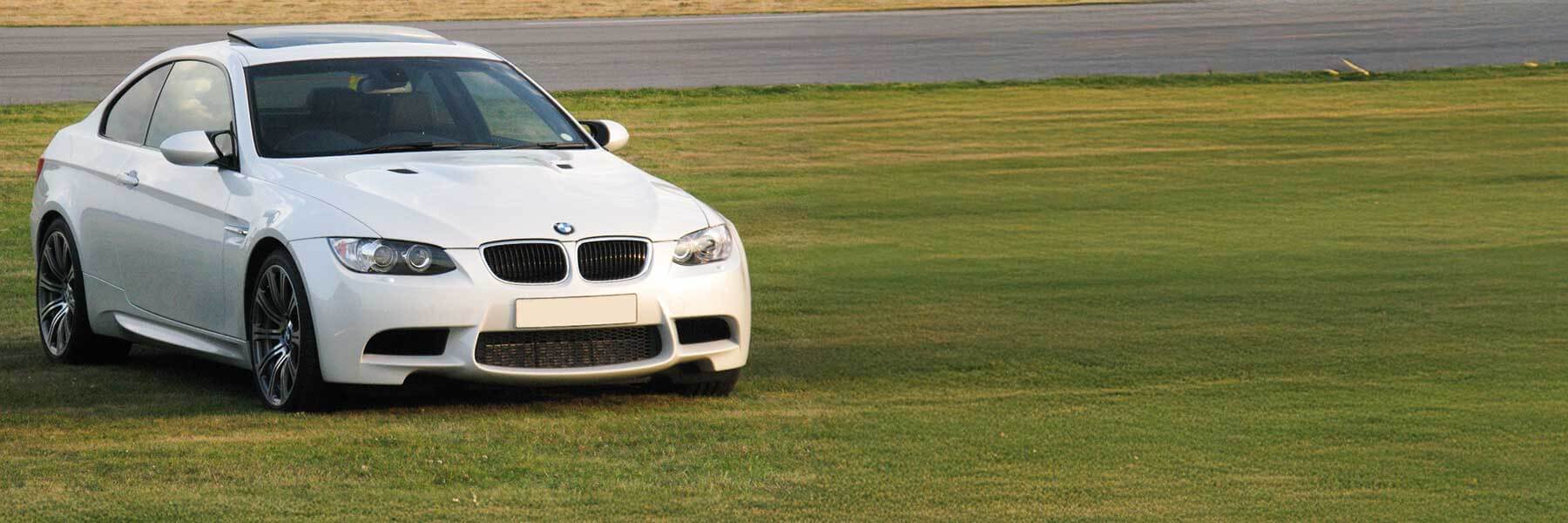 Banner image of a  BMW M3 E90 featuring original BMW wheels.
