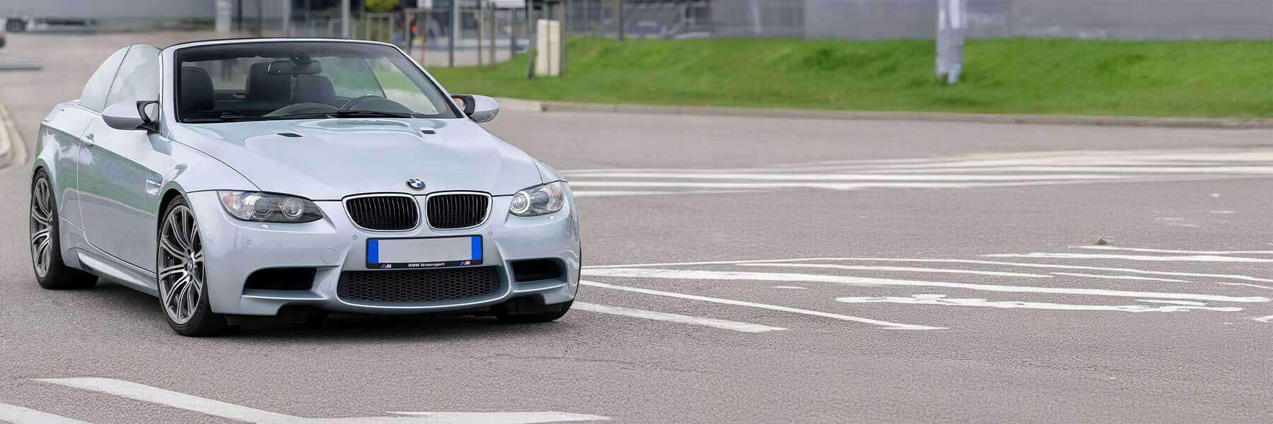 Banner image of a  BMW M3 E93 featuring original BMW wheels.