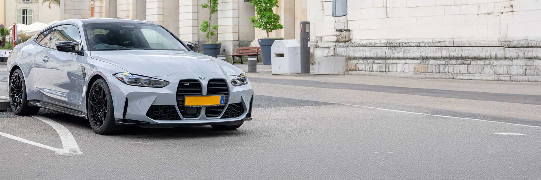 Banner image of a  BMW M4 G82 featuring original BMW wheels.