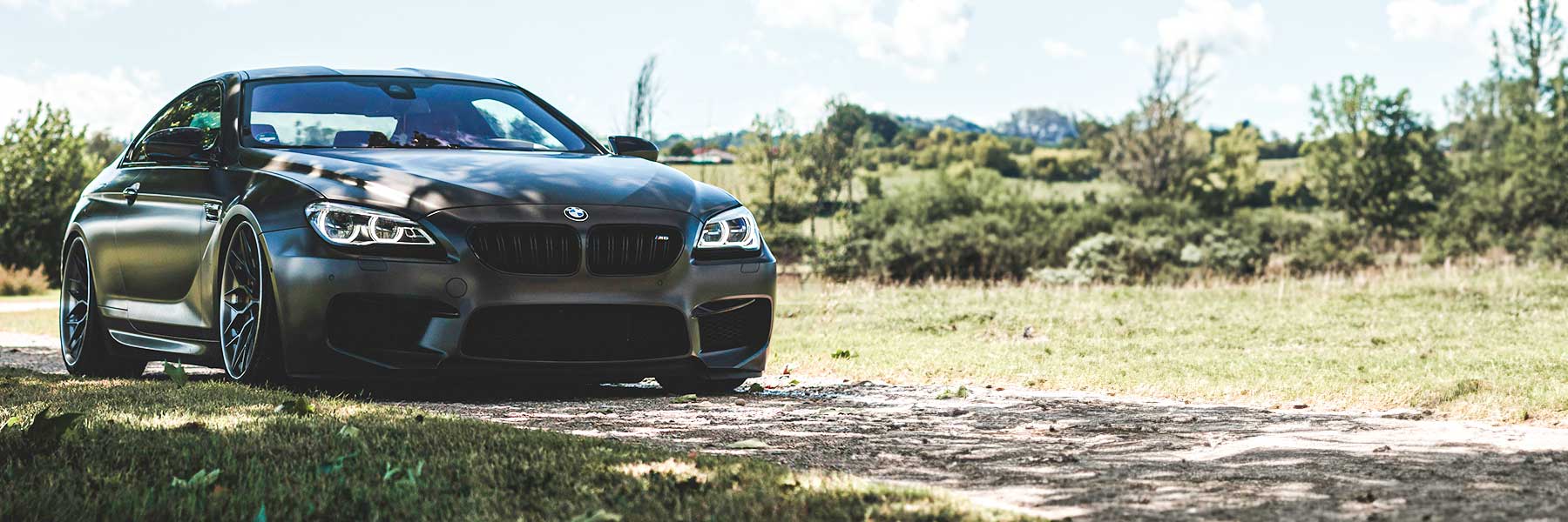 Banner image of a  BMW M6 F13 featuring original BMW wheels.