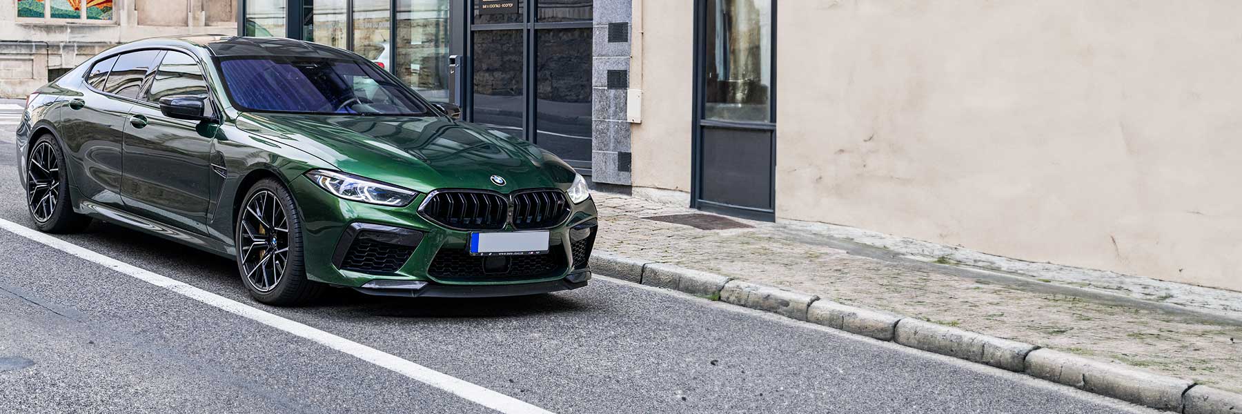 Banner image of a  BMW M8 F93 featuring original BMW wheels.