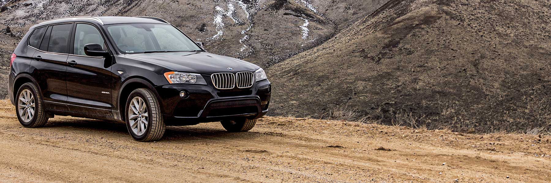 Banner image of a  BMW X3 F25 featuring original BMW wheels.